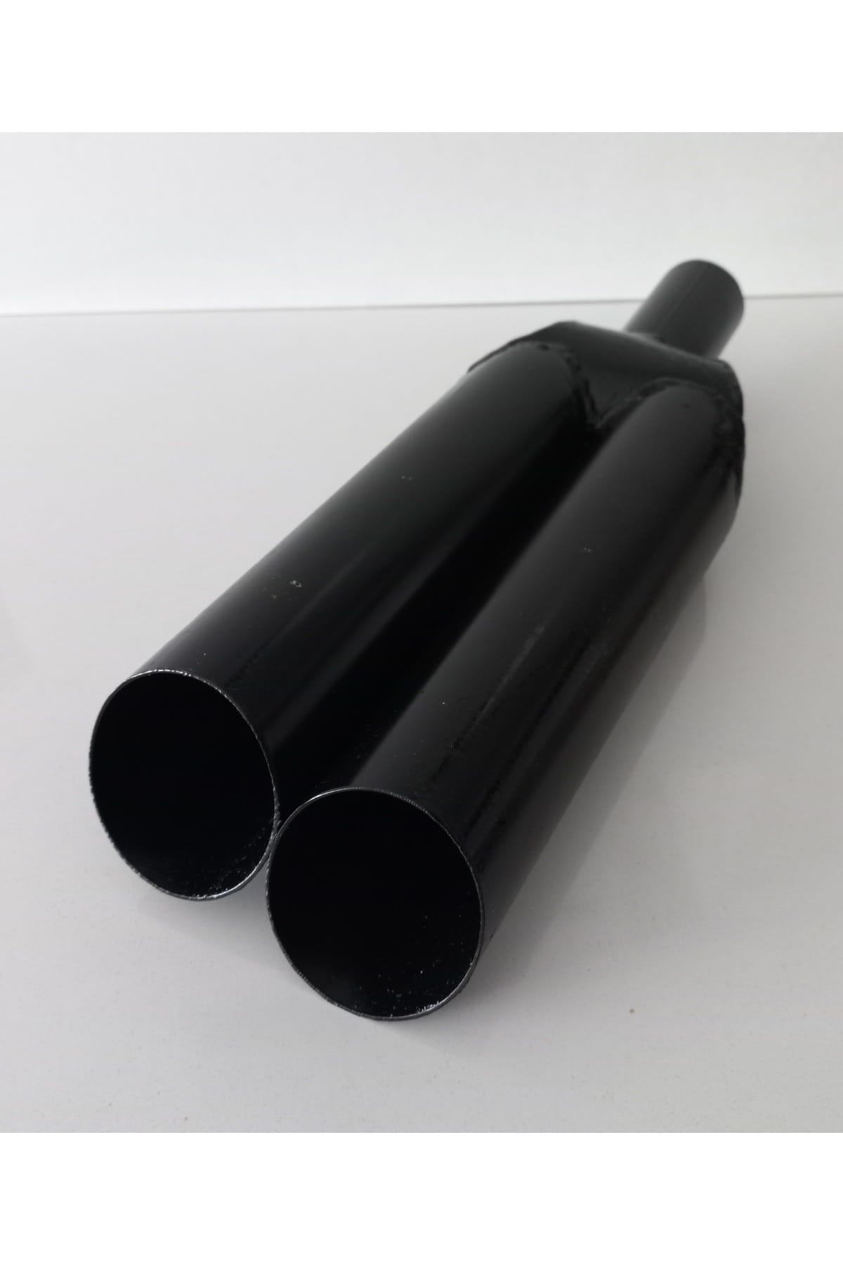 Matte black Wolf Exhaust Sound Model with nickel-plated dual exhaust tip. Matte black wolf exhaust sound-producing model with nickel-plated dual exhaust tips.